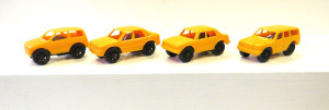 Spielautos mit Schwungradantrieb 1987 , orange