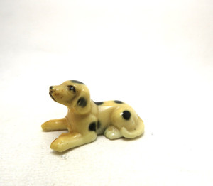 Alte Miniaturen Hunde Dalmatiner liegend