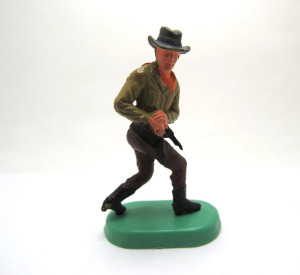 Cowboy auf Bodenplatte 1975 Cowboy mit Colt 